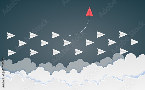 Minimalist stile red airplane changing direction and white ones. New idea, innovation and unique way concept