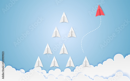 Minimalist stile red airplane changing direction and white ones. New idea, innovation and unique way concept