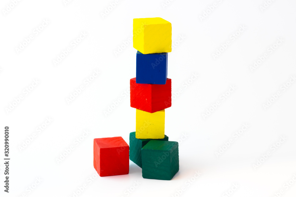 Toy wooden building blocks on white background Toy wooden building blocks on white background