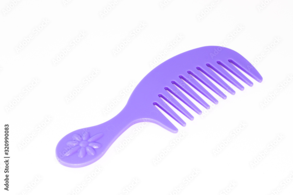 Children toy hairbrush isolated on white background. Children toy hairbrush isolated on white background.