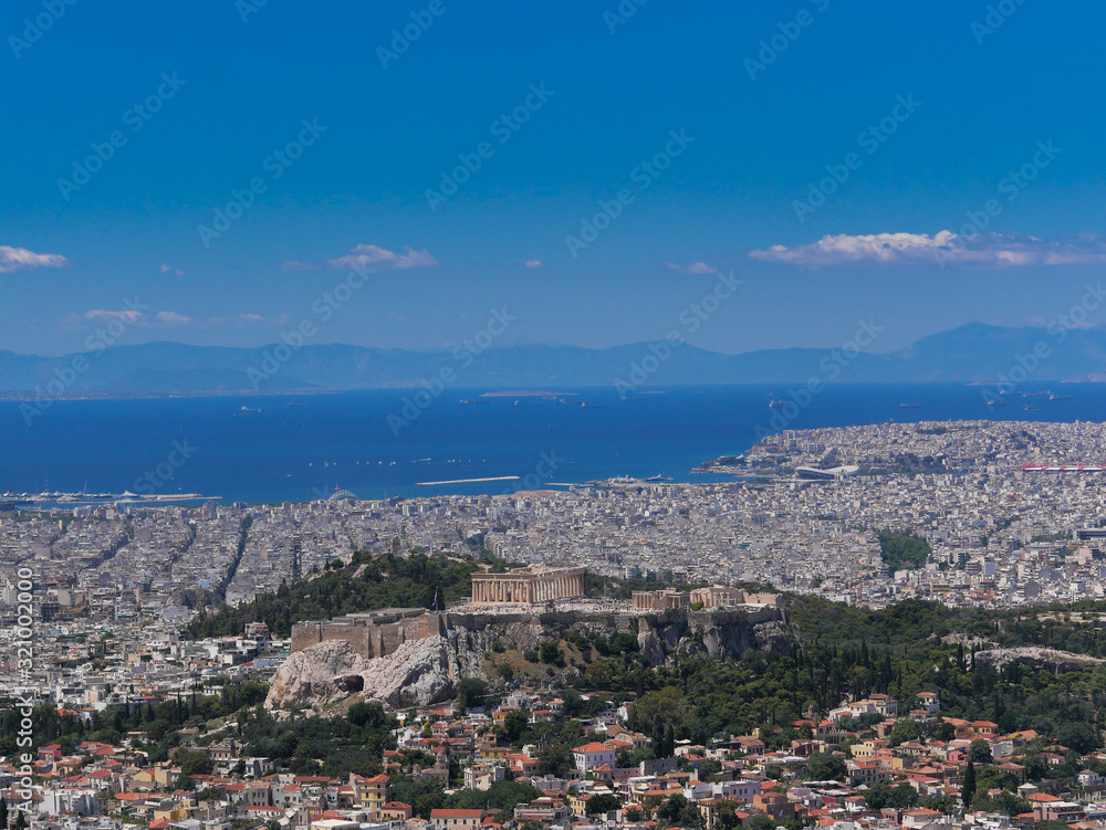 Greece, Athens urban area panoramic view with acropolis and Saronic gulf in the background