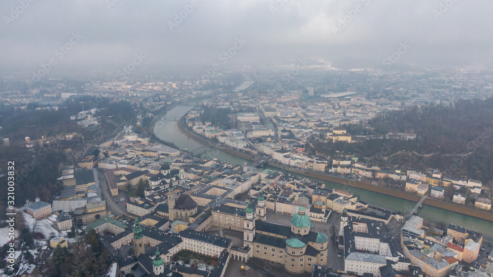 Aerial view of Salzburg old town and Hohensalzburg Fortress. View on City and river from above 