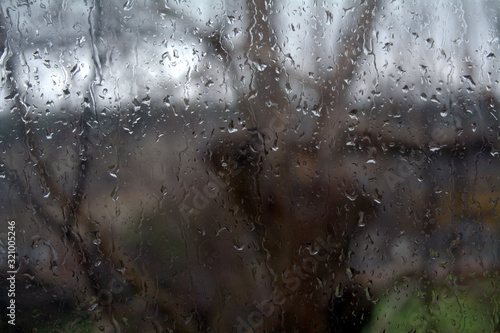 fallen raindrops on the window pane