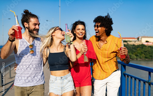 Group of young friends having fun together outdoor