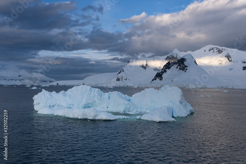 Sunset over the Stunning icy landscapes, Chiriguano Bay, Danko Island, Antarctic Peninsula, Antarctica photo