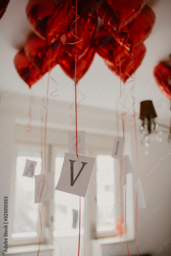 Room full of balloon shaped hearts for Valentine's day