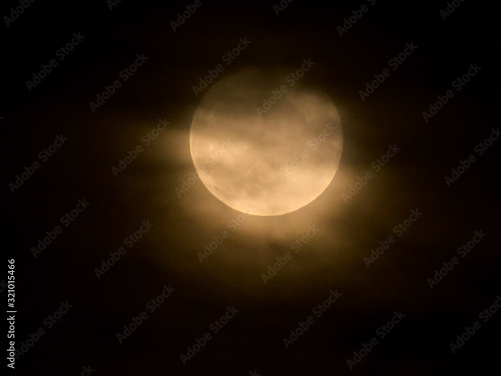 Full moon behind the clouds Full moon behind the clouds