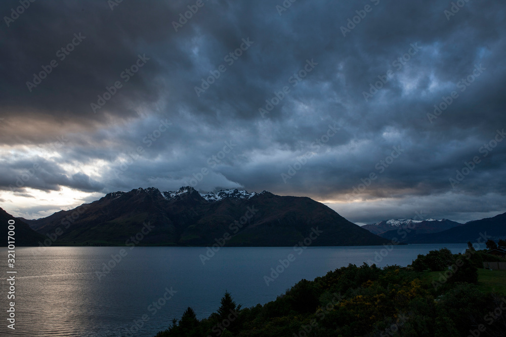 Lake Wakatipu. Mountains. Clouds. Sunset. Twilight