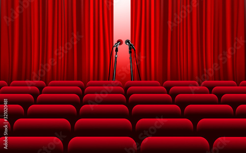 chairs with microphone on the stage	