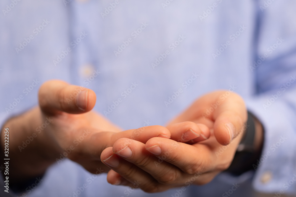 Businessman without head holding something without theme Businessman without head holding something without theme