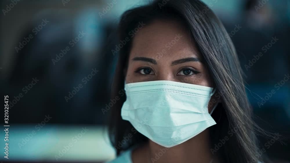 young Asian woman wearing a mask to prevent virus. Prevention of infection in the air. Coronavirus concept young Asian woman wearing a mask to prevent virus. Prevention of infection in the air. Coronavirus concept