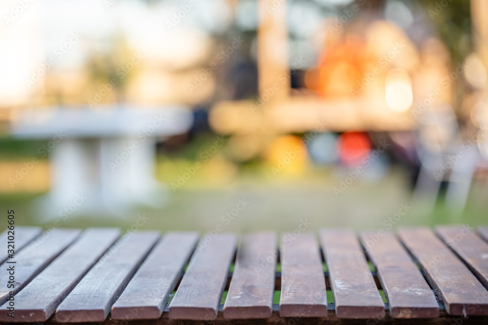 Empty wooden table space platform and blurred background for product display montage..