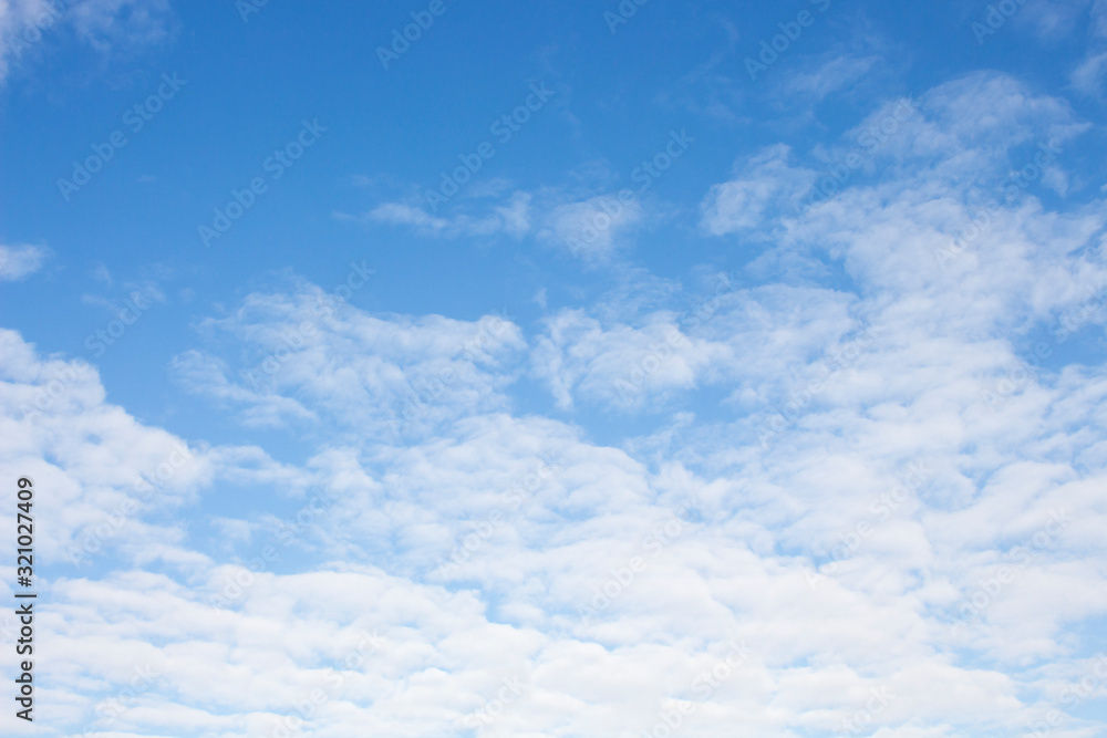 Bright blue sky with white clouds for background or wallpapers Bright blue sky with white clouds for background or wallpapers