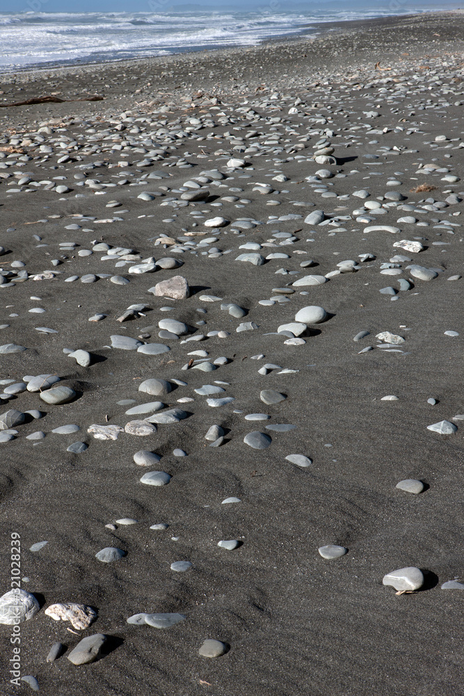 Okarita South island coast. New Zealand. Stones at beack. pebbles Okarita South island coast. New Zealand. Stones at beack. pebbles