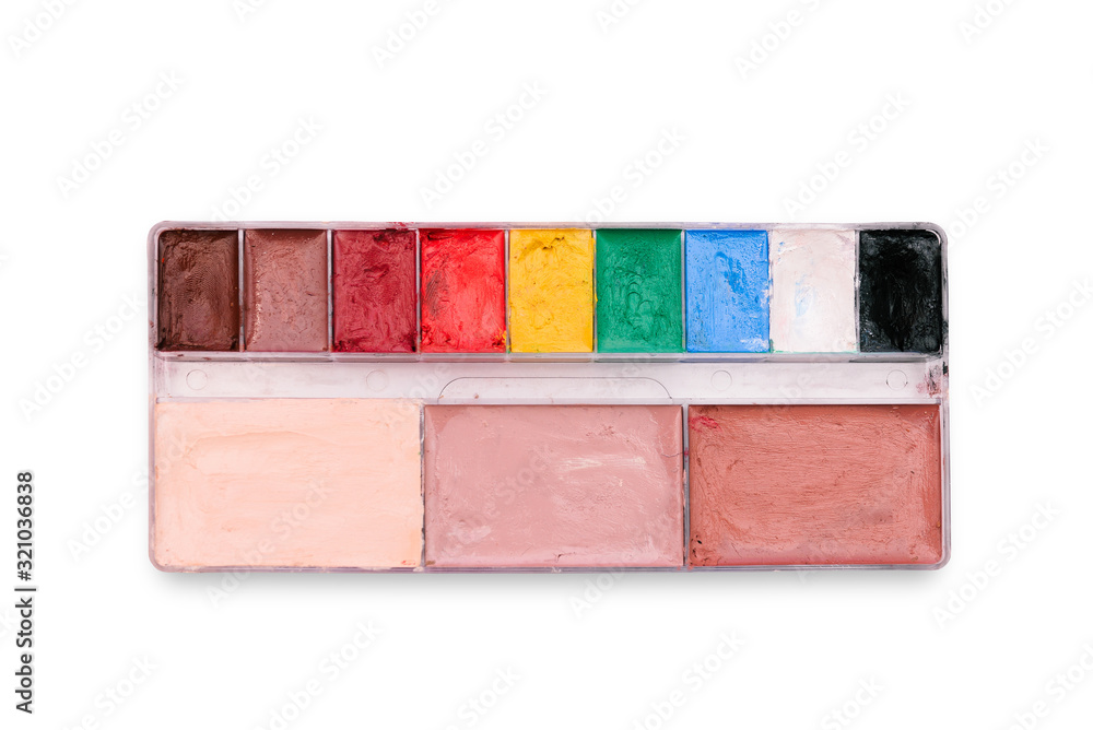 Palette for drawing on a white background. The concept of creativity, art, drawing. Tools of the artist. Top view, copy space Palette for drawing on a white background. The concept of creativity, art, drawing. Tools of the artist. Top view, copy space