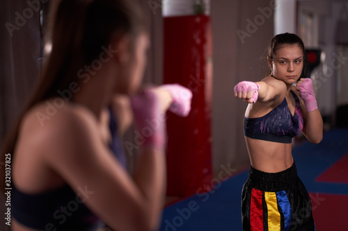 Boxer girl shadow boxing