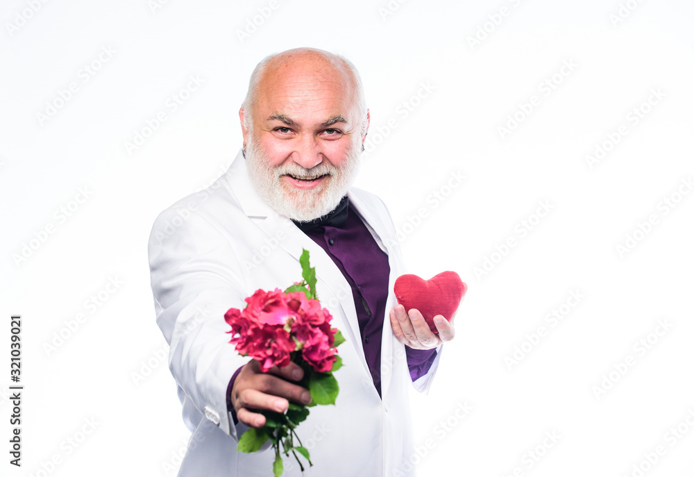 This is for you. Senior gentleman romantic. Man hold heart symbol of love. Gentleman concept. True gentleman. Handsome bearded man wear tuxedo. Romance and dating. Dating services for elderly people This is for you. Senior gentleman romantic. Man hold heart symbol of love. Gentleman concept. True gentleman. Handsome bearded man wear tuxedo. Romance and dating. Dating services for elderly people
