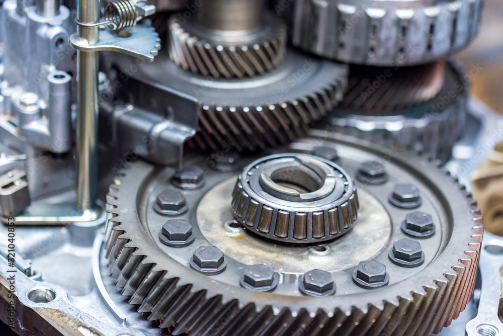 Close-up helical gears in car automatic transmission Close-up helical gears in car automatic transmission