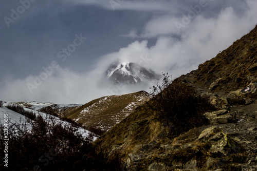 Kazbeg mountain in winter in Northern Georgia