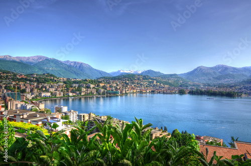 Cityscape Lugano and with Alpine Lake and Mountain in Ticino, Switzerland. photo