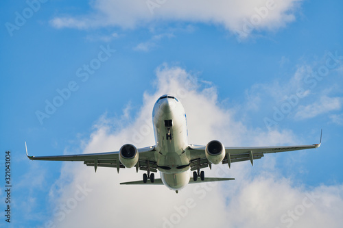 Airliner landing at the airport photo