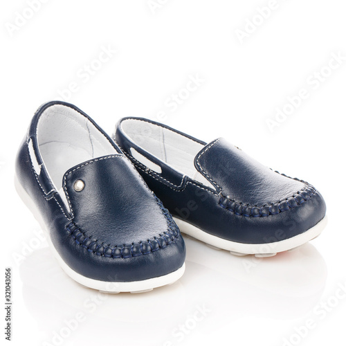 Blue leather shoes for children isolated on white