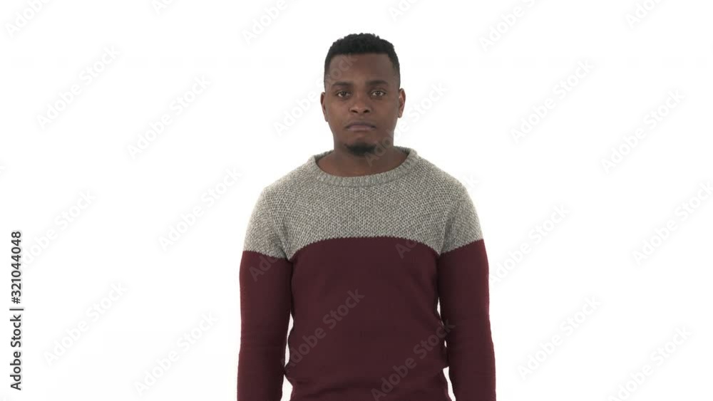 I don't know gesture. Portrait of confused handsome young man in casual style clothes standing with raised up shoulders and looking at camera. Isolated, on white background I don't know gesture. Portrait of confused handsome young man in casual style clothes standing with raised up shoulders and looking at camera. Isolated, on white background