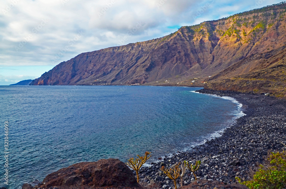 Rocky coast and ocean landscape of of El Hierro island,Canary Islands,Spain.Selective focus.