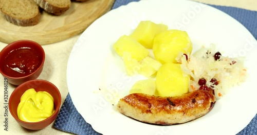 Stop motion. Sausage with potatoes. German traditional cuisine