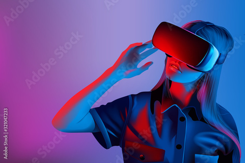 Woman with vr set with blue and purple lights