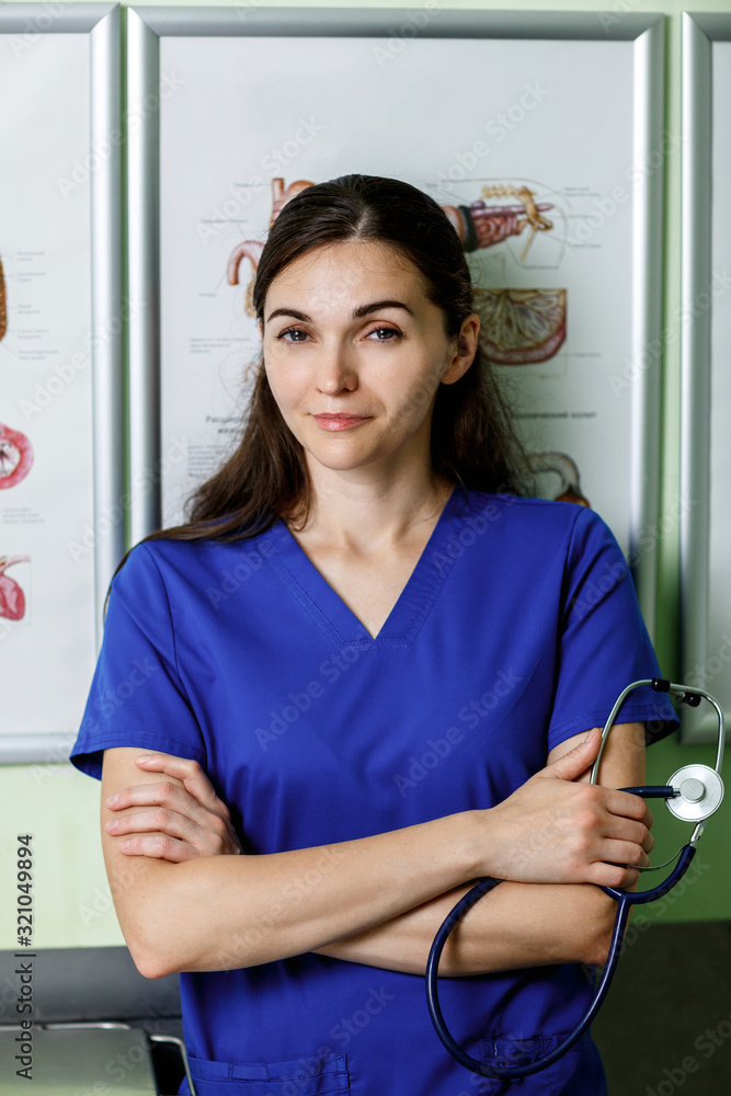 Portrait of a veterinarian. Woman veterinarian doctor in his office waiting for a patient Portrait of a veterinarian. Woman veterinarian doctor in his office waiting for a patient