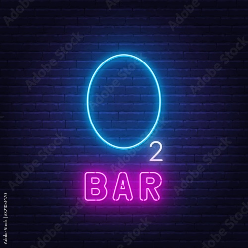 Neon lettering oxygen bar on a dark background.