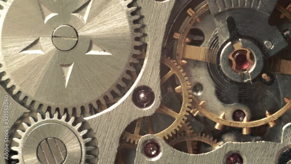 Gears rotate, mechanism close up