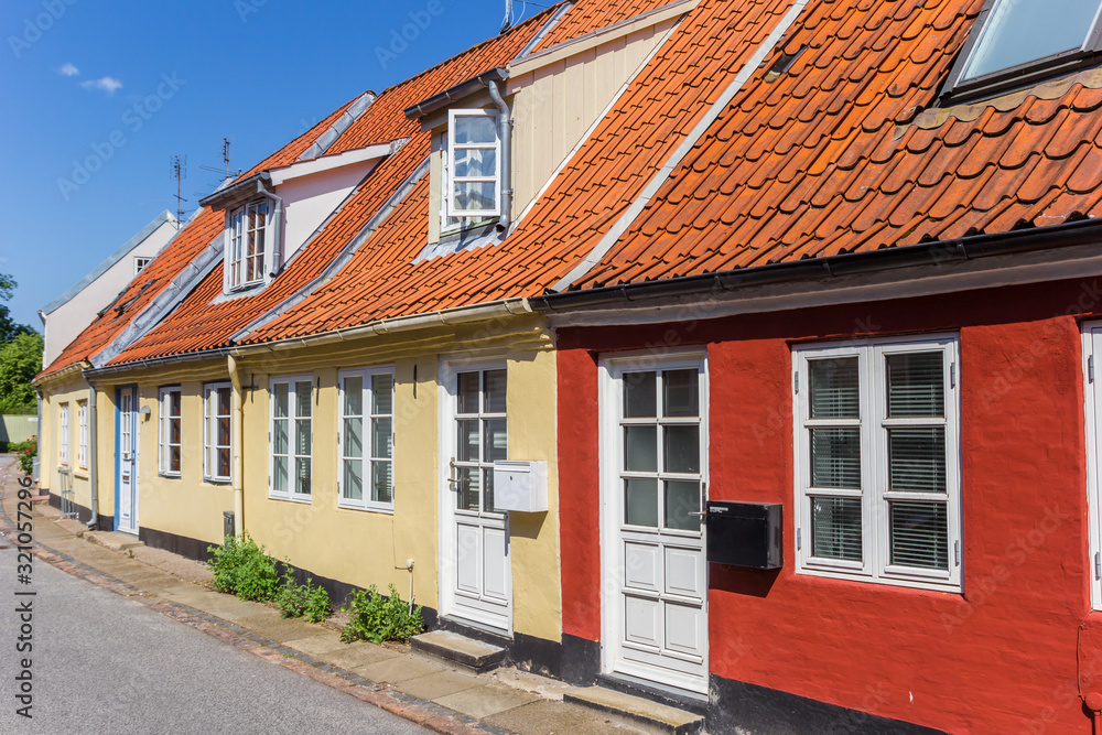 Red and yellow houses in the historic streets of Tonder, Denmark