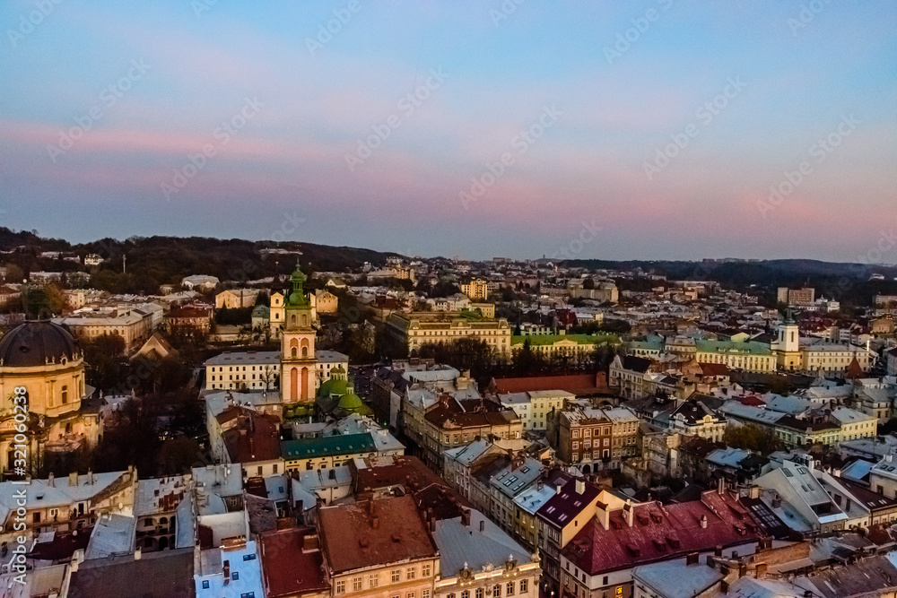 View on Dominican cathedral, Dormition church and historic center of the Lviv at sunset. View on Lvov cityscape from the town hall