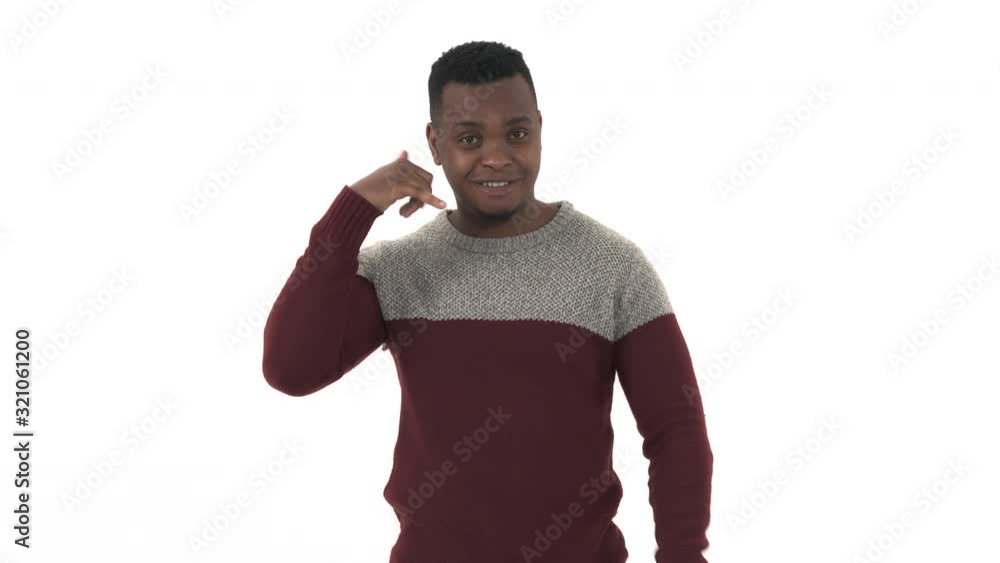 Handsome man pointing with index finger at you and showing call me sign ...