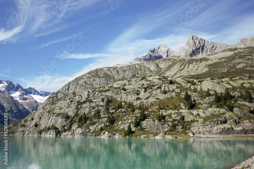 Mountains in the swiss alps on a summer day photo