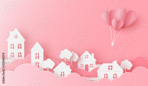 Views of the house in love with heart balloon flying on the pink sky