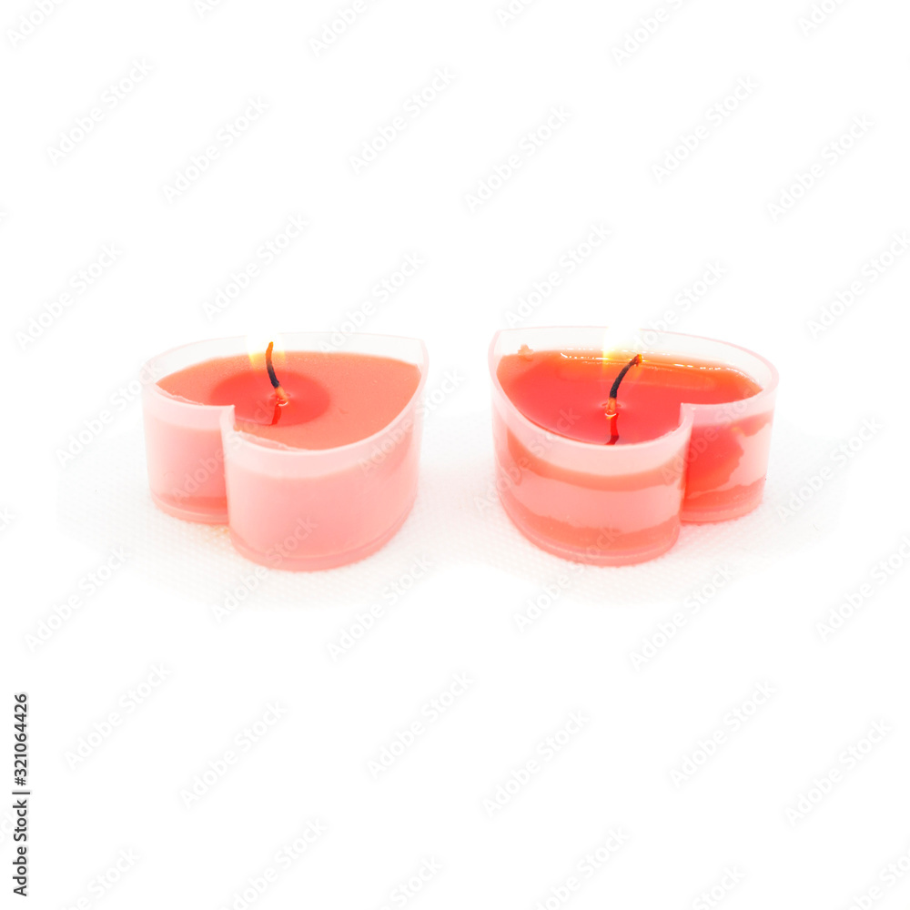 Two valentine day candle hearts isolated on white background Two valentine day candle hearts isolated on white background
