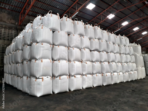 Chemical fertilizer Urea Stock pile jumbo-bag in warehouse waiting for shipment.