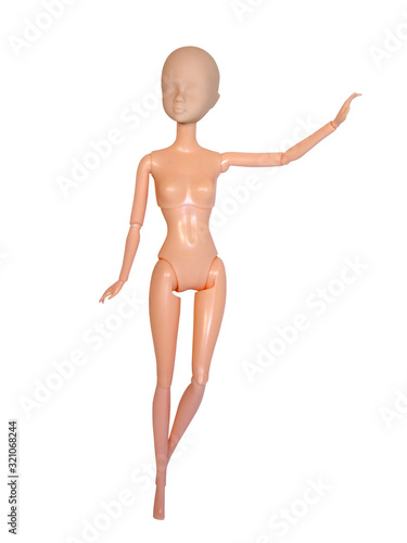 Naked female doll with movable joints isolated on a white background.