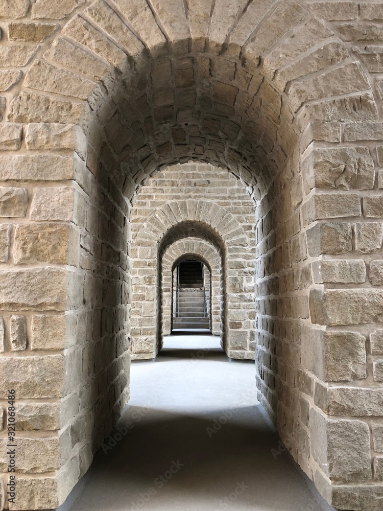 Stone hallway to stairs. Bock Casemates in Luxembourg, Europe.