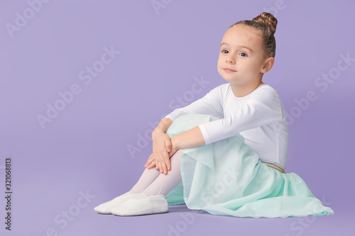 Cute little ballerina on co...
