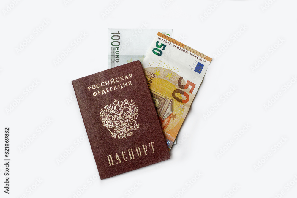 passport and money on a white background. passport of the Russian Federation, Russia and the Euro. money, 100 euros, 50 euros. money inserted in the passport. news about money. passport and banner passport and money on a white background. passport of the Russian Federation, Russia and the Euro. money, 100 euros, 50 euros. money inserted in the passport. news about money. passport and banner