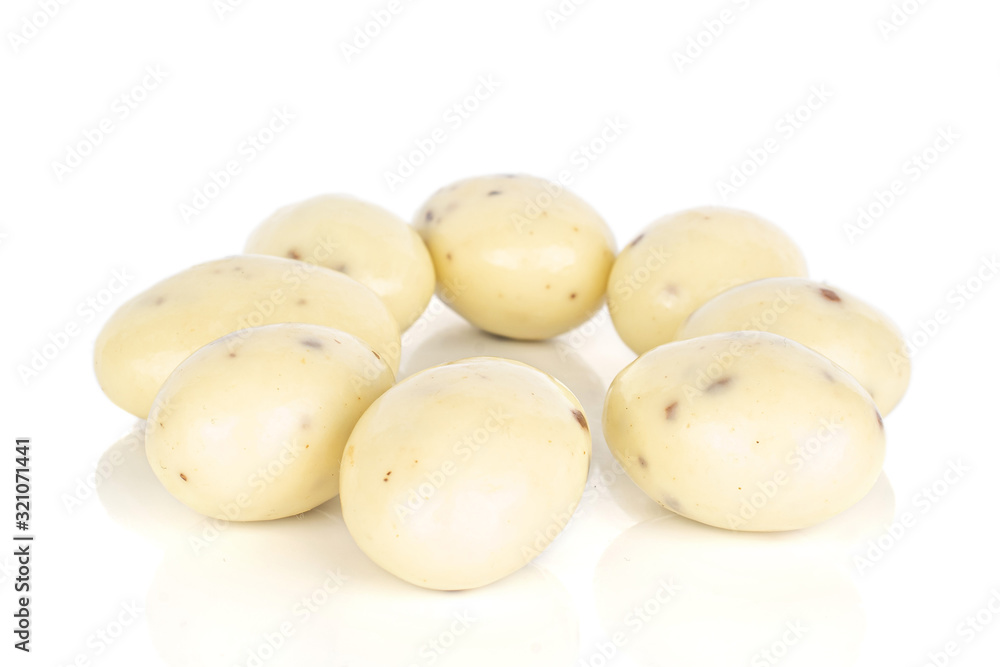 Group of eight whole coated white almond nut stracciatella isolated on white background Group of eight whole coated white almond nut stracciatella isolated on white background