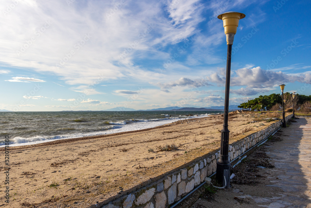 Empty November off-season promenade with the coastline of Fanari, Rhodope prefecture, Greece