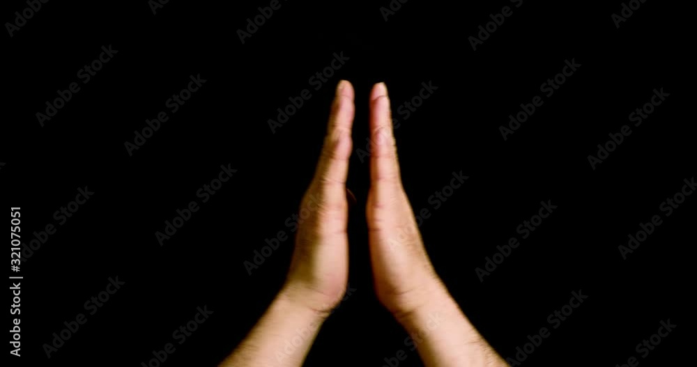 Clapping applause gesture by male hand isolated on neutral black background, 4k video studio shoot Clapping applause gesture by male hand isolated on neutral black background, 4k video studio shoot