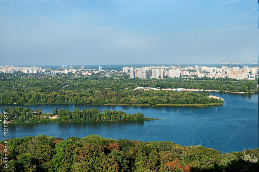 Panoramic view of buildings, Kyiv-Pechersk Lavra churches, the Dnieper river and in Kyiv, Ukraine