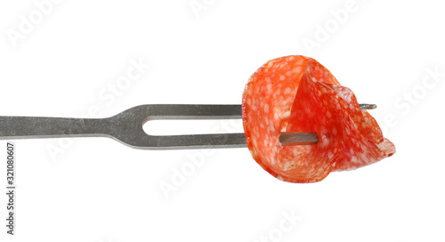 Thin salami slice on fork