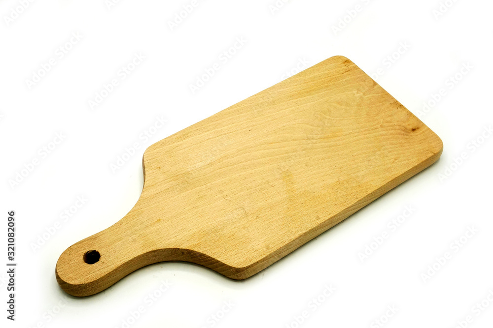 Fototapeta premium Wooden kitchen utensils on white background. Handcrafted cutting board.